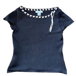 August Silk Logic black top.  White criss crossed ribbons throughout neckline.